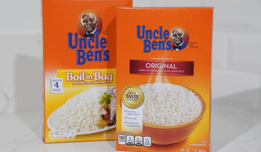 Boxes of Uncle Ben&#39;s rice are displayed on Wednesday, June 17, 2020, in Long Beach, Calif. The owner of the Uncle Bens brand of rice says the brand will evolve in response to concerns about racial stereotyping. This comes after Quaker Oats retiring the 131-year-old Aunt Jemima brand, saying the company recognizes the characters origins are based on a racial stereotype. (AP Photo/Ashley Landis)