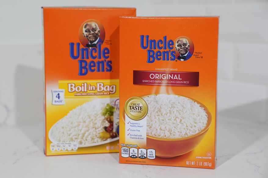 Boxes of Uncle Ben's rice are displayed on Wednesday, June 17, 2020, in Long Beach, Calif. The owner of the Uncle Bens brand of rice says the brand will evolve in response to concerns about racial stereotyping. This comes after Quaker Oats retiring the 131-year-old Aunt Jemima brand, saying the company recognizes the characters origins are based on a racial stereotype. (AP Photo/Ashley Landis)