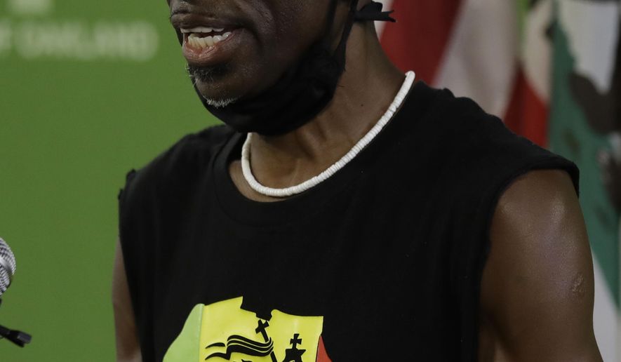 Oakland Cultural Affairs Commission member Theo Aytchan Williams speaks during a media conference on Wednesday, June 17, 2020, in Oakland, Calif. Williams, along with Oakland Mayor Libby Schaff, discussed the presence of ropes found at Lake Merritt. (AP Photo/Ben Margot)