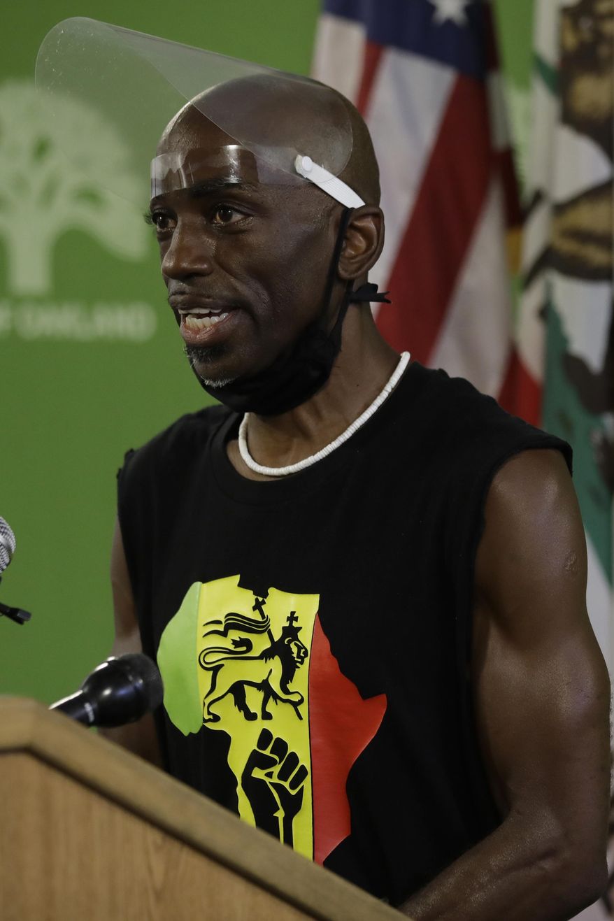 Oakland Cultural Affairs Commission member Theo Aytchan Williams speaks during a media conference on Wednesday, June 17, 2020, in Oakland, Calif. Williams, along with Oakland Mayor Libby Schaff, discussed the presence of ropes found at Lake Merritt. (AP Photo/Ben Margot)