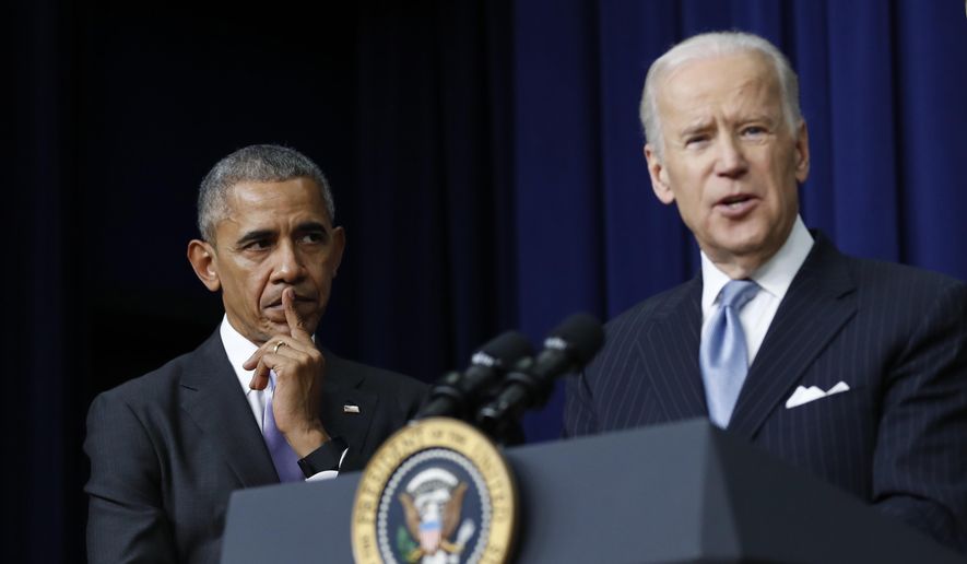 In this Dec. 13, 2016, file photo, President Barack Obama listens as Vice President Joe Biden speaks in the South Court Auditorium in the Eisenhower Executive Office Building on the White House complex in Washington. Biden is getting some help from Obama as he looks to fill his campaign coffers and unify the Democratic party ahead of the November election. Obama and Biden will appear together Tuesday, June 23, for a “virtual grassroots fundraiser,” the former vice president announced on Twitter. (AP Photo/Carolyn Kaster, File)