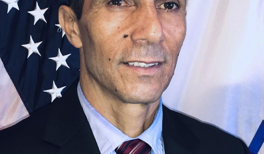 This November, 25, 2019 photo provided by the Israeli Foreign Ministry shows Israel's first Bedouin Arab diplomat Ishmael Khaldi in Miami, Florida. Khaldi who was once deployed abroad to push back against Israel's critics said he was beaten by overzealous security guards at Jerusalem’s central bus station on Thursday, June 11, 2020. Khaldi said he believes it was a case of ethnic profiling. He said he filed a police complaint and went public with his experience in order to shine a light on racist behavior that he says exists in sectors of the country that he loves. (Israeli Consulate in Miami via AP)