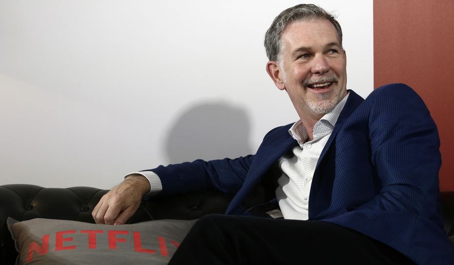 FILE - In this Feb. 28, 2017, file photo, Netflix Founder and CEO Reed Hastings smiles during an interview in Barcelona, Spain. Hastings and his wife, Patty Quillin, are donating $120 million toward student scholarships at historically black colleges and universities. (AP Photo/Manu Fernandez, File)