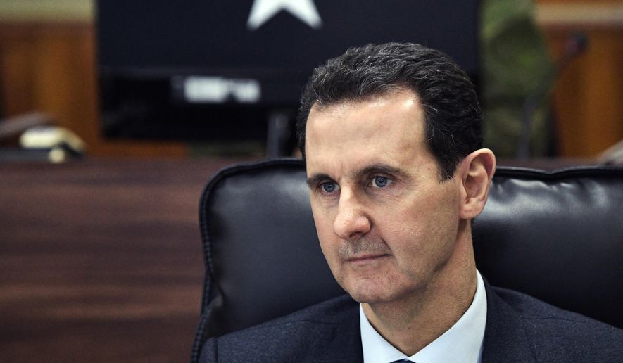 The Trump administration is ramping up pressure on Syrian President Bashar Assad and his inner circle with a raft of new economic and travel sanctions for human rights abuses. (Alexei Nikolsky, Sputnik, Kremlin Pool Photo via AP)