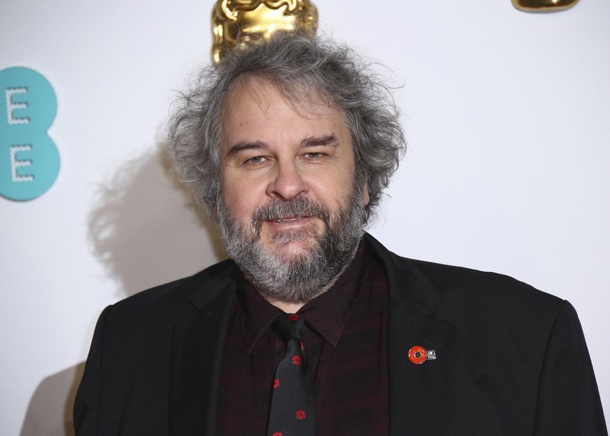 FILE - In this Feb. 10, 2019 file photo, Peter Jackson poses for photographers at the BAFTA awards in London. Jackson's company, Weta Digital, one of the world’s premier visual effects companies, will begin producing original content. (Photo by Joel C Ryan/Invision/AP, File)