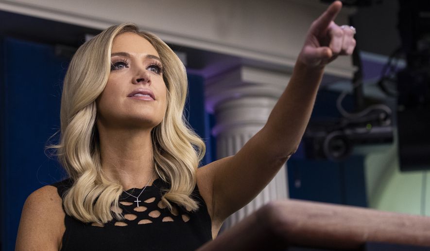 White House press secretary Kayleigh McEnany points to a question during a press briefing in the James Brady Press Briefing Room at the White House, Friday, June 19, 2020, in Washington. (AP Photo/Alex Brandon)