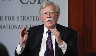 FILE - In this Sept. 30, 2019, file photo, former National security adviser John Bolton gestures while speakings at the Center for Strategic and International Studies in Washington.   A federal judge has ruled, Saturday, June 20, 2020, that former national security adviser John Bolton can move forward in publishing his tell-all book. The Trump administration had tried to block the release because of concerns that classified information could be exposed.(AP Photo/Pablo Martinez Monsivais, File)