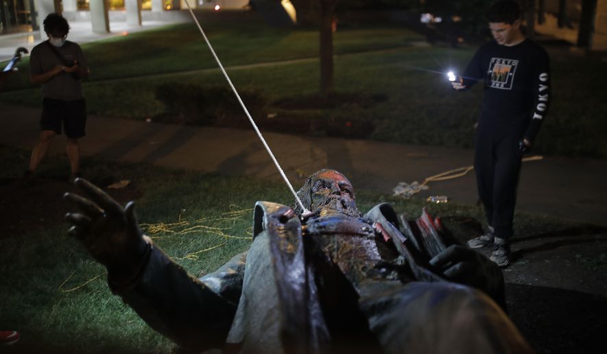 DC protesters pull down, burn statue of Confederate general