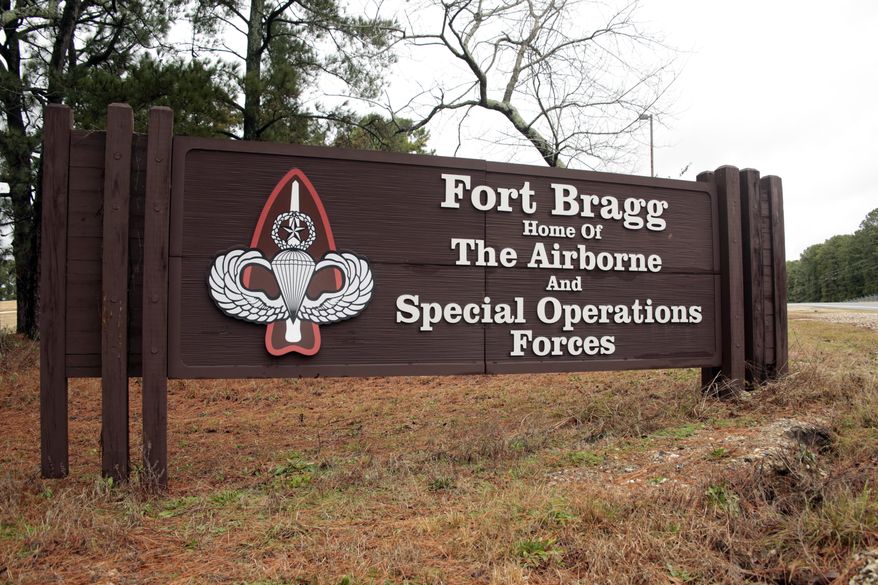 This Jan. 4, 2020, photo shows a sign for at Fort Bragg, N.C.  The fight over removing the names of Confederate generals from U.S. Army bases, like Fort Bragg in Fayetteville, has become a national debate. (AP Photo/Chris Seward) **FILE**