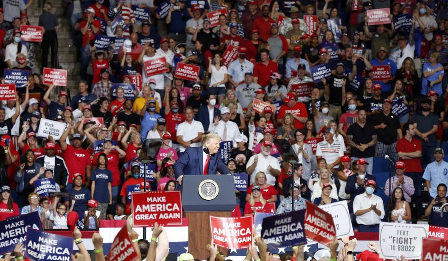 President Donald Trump, front center, speaks at BOK Center during his rally in Tulsa, Okla., Saturday, June 20, 2020. (Stephen Pingry/Tulsa World via AP)