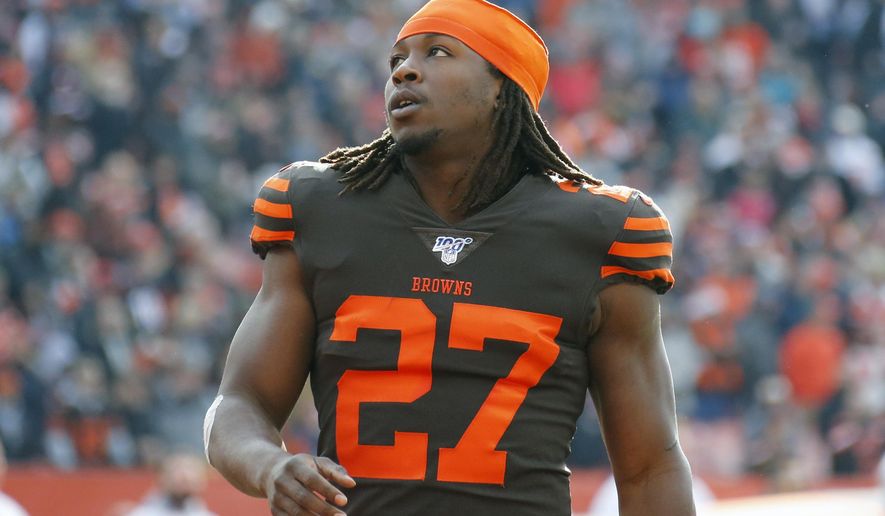 FILE - In this Dec. 8, 2019, file photo, Cleveland Browns running back Kareem Hunt (27) stands on the field before an NFL football game against the Cincinnati Bengals, in Cleveland. Scared he jeopardized his NFL career when police found a small amount of marijuana in his car during a traffic stop, Hunt, who served an eight-game league suspension last season for physical altercations while with Kansas City, said Monday, June 22, 2020, that he&#39;s grateful the Browns have stood by him.(AP Photo/Ron Schwane, File)