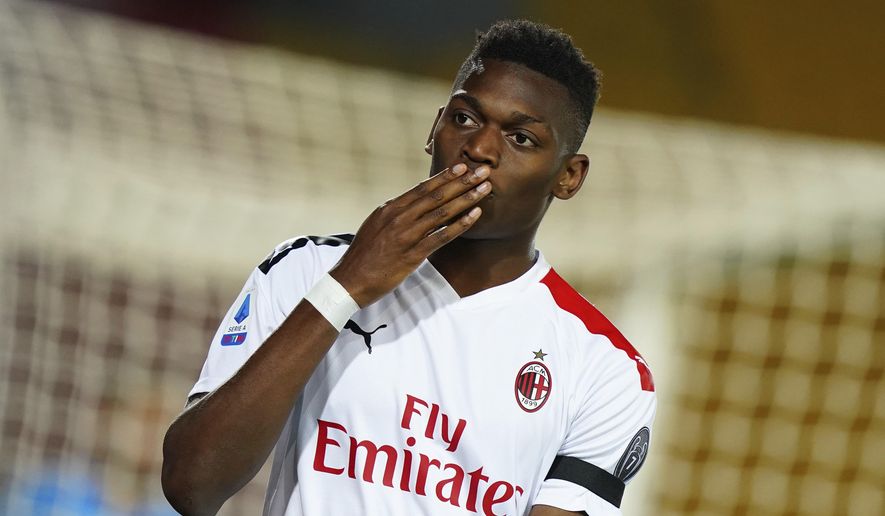 AC Milan's Rafael Leao celebrates after he scored his side's fourth goal during the Serie A soccer match between Lecce and AC Milan, at the Via del Mare stadium in Lecce, Italy, Monday, June 22, 2020. (Spada/LaPresse via AP)