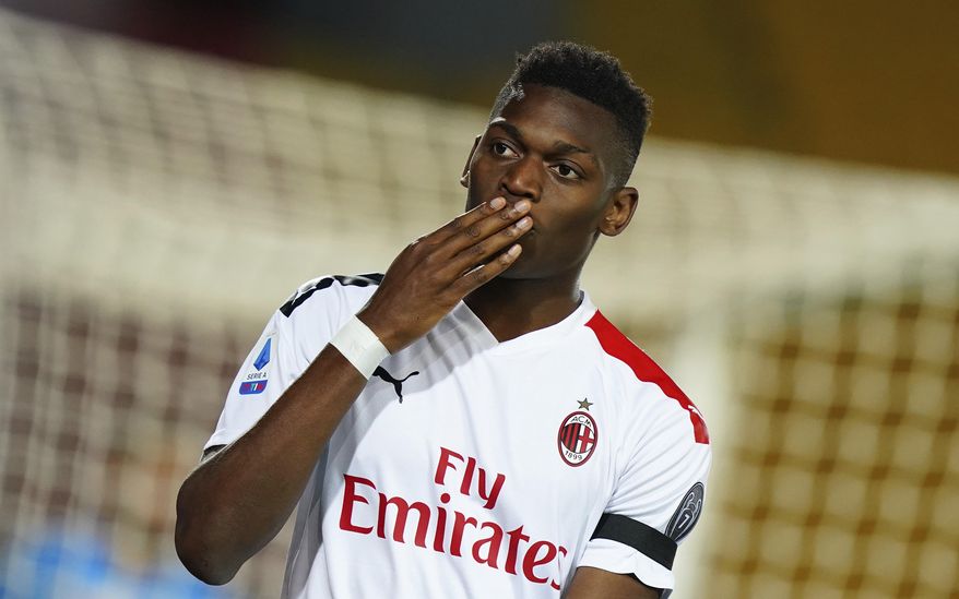 AC Milan's Rafael Leao celebrates after he scored his side's fourth goal during the Serie A soccer match between Lecce and AC Milan, at the Via del Mare stadium in Lecce, Italy, Monday, June 22, 2020. (Spada/LaPresse via AP)
