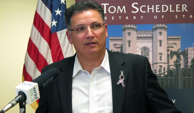 FILE - In this July 12, 2017 file photo, former state Rep. John Schroder, R-Covington, speaks after completing his paperwork to run for state treasurer, in Baton Rouge, La. Louisiana's State Treasurer Schroder says some small businesses harmed by the coronavirus pandemic should start seeing grants from a $300 million federally financed program as soon as next month. The money is part of $1.8 billion in direct congressional relief that Louisiana received to respond to COVID-19. Schroder told lawmakers Monday, June 22, 2020, that he hopes to have distributed all of the aid over a few months.  (AP Photo/Melinda Deslatte, File)