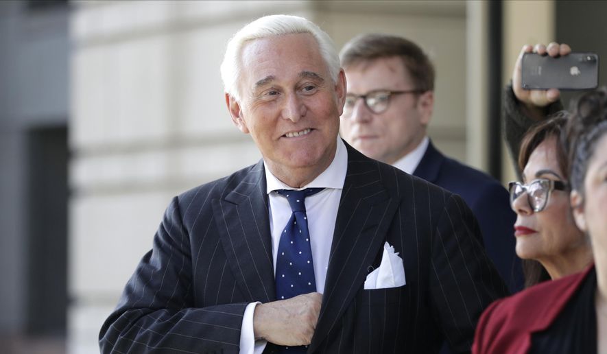 In this Nov. 15, 2019, file photo, Roger Stone exits the federal court in Washington. (AP Photo/Julio Cortez, File)