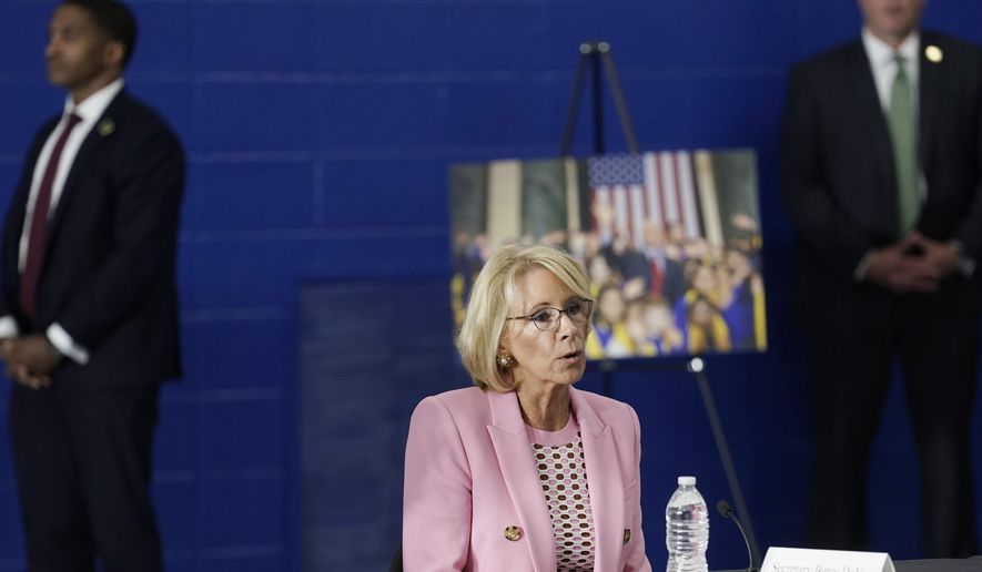 Education Secretary Betsy DeVos participates in a roundtable event at Waukesha STEM Academy Tuesday, June 23, 2020, in Waukesha, Wis. (AP Photo/Morry Gash) **FILE**