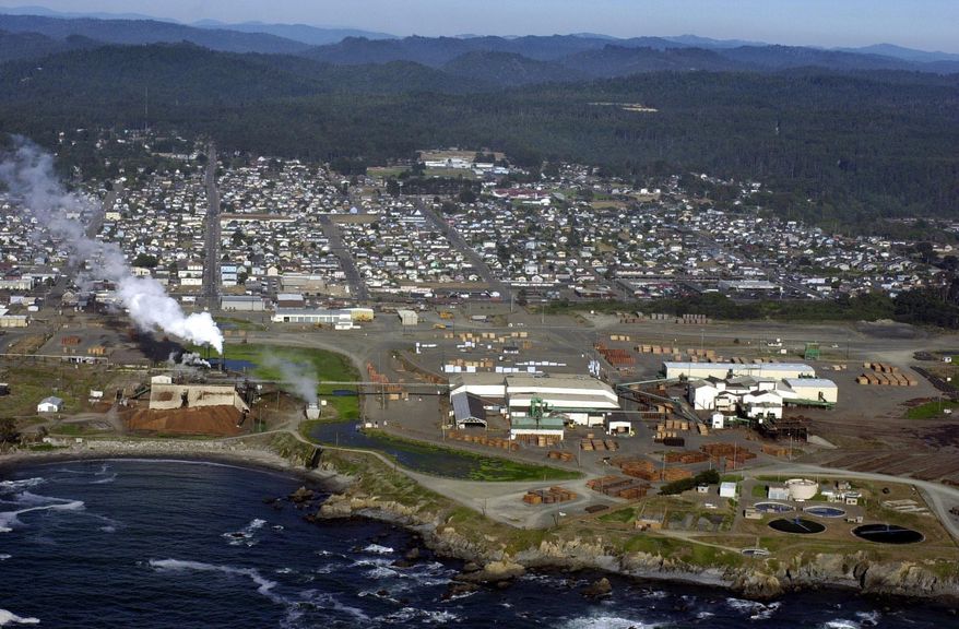 In this July 10, 2002, file photo, an aerial view of the Georgia Pacific timber mill is seen in the foreground, in Fort Bragg, Calif. (AP Photo/Marcio Jose Sanchez) ** FILE **