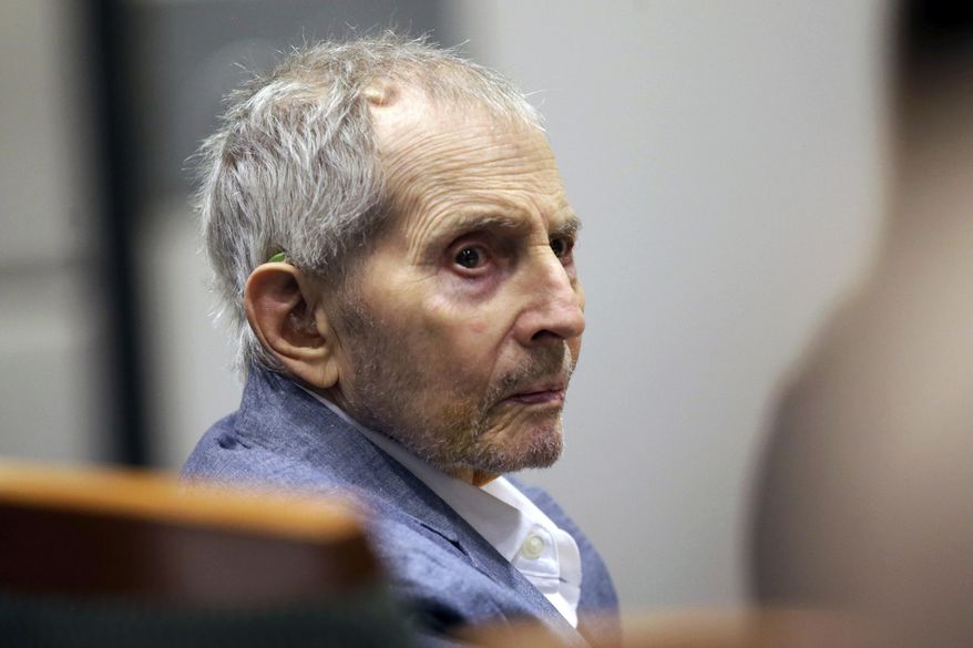FILE - In this March 10, 2020, file photo, real estate heir Robert Durst looks over during his murder trial in Los Angeles. A Los Angeles judge denied a request for a mistrial in the murder case against Durst after a three-month delay from the coronavirus outbreak. Judge Mark Windham said Tuesday, June 23, 2020, that Durst's right to a fair trial has not been compromised by putting the case on hold in March just days after it began. (AP Photo/Alex Gallardo, Pool, File)
