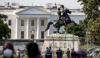 The White House is visible behind a statue of President Andrew Jackson in Lafayette Park, Tuesday, June 23, 2020, in Washington, with the word &amp;quot;Killer&amp;quot; spray painted on its base. Protesters tried to topple the statue Monday night. President Tump had tweeted late Monday that those who tried to topple the statue of President Andrew Jackson in Lafayette Park across the street from the White House faced 10 years in prison under the Veteran&#39;s Memorial Preservation Act.  (AP Photo/Andrew Harnik)