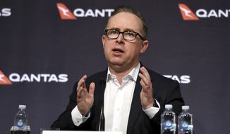 Qantas Chief Executive Alan Joyce speaks during a press conference in Sydney, Thursday, June 25, 2020. Qantas, Australia&#39;s largest airline, says it plans to cut at least 6,000 jobs and keep 15,000 more workers on extended furloughs as it tries to survive the coronavirus pandemic. Joyce announced a plan to reduce costs by billions of dollars and raise fresh capital. The plan includes grounding 100 planes for a year or more and immediately retiring its six remaining Boeing 747 planes. (Bianca De Marchi/AAP Image via AP)