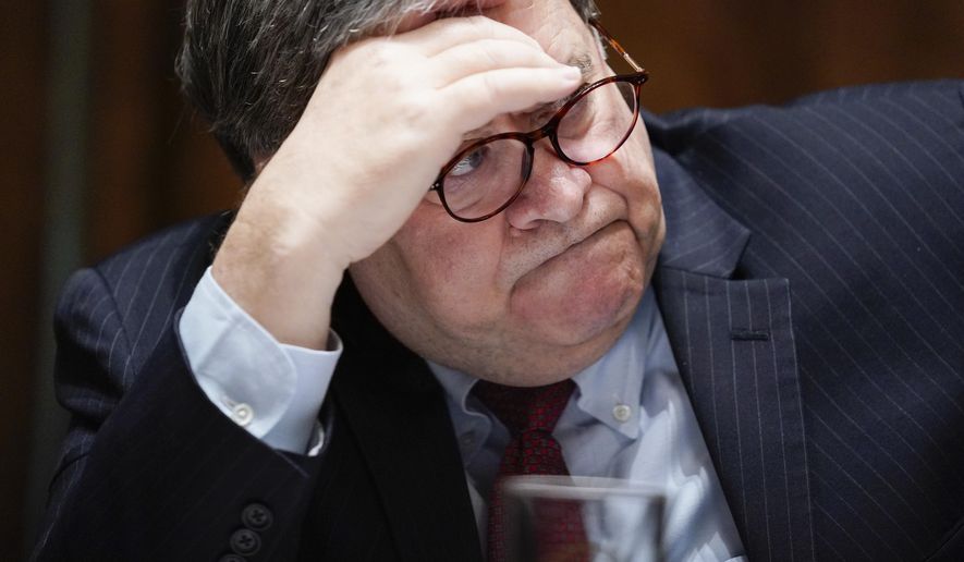 Attorney General William Barr listens during a roundtable with President Donald Trump about America&#39;s seniors, in the Cabinet Room of the White House, Monday, June 15, 2020, in Washington. (AP Photo/Evan Vucci)