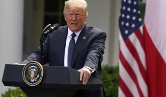 President Donald Trump speaks during a news conference with Polish President Andrzej Duda in the Rose Garden of the White House, Wednesday, June 24, 2020, in Washington. (AP Photo/Evan Vucci)