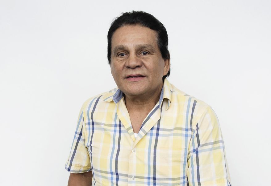 This Aug. 4, 2016 photo shows boxer Roberto Durán posing for a portrait in New York, to promote the film, "Hands of Stone." The film, about Duran and boxing trainer Ray Arcel, opens on Aug. 26. Durán, who held world championships in four weight classes during his more than three-decade career, has tested positive for the coronavirus but has had only mild symptoms so far, one of his sons said Thursday, June 25, 2020. (Photo by Taylor Jewell/Invision/AP, File)