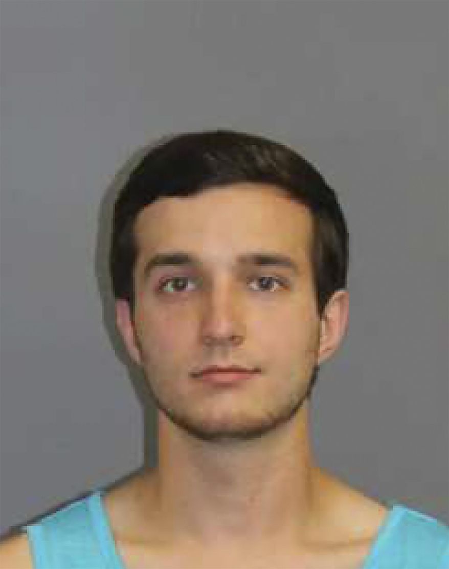 This June 24, 2020 booking photo provided by Connecticut State Police shows Alexander Hassinger, who was arrested at his Newtown home Wednesday evening on harassment and breach of peace charges. Connecticut State police said Hassinger posted a threat earlier in the day on Twitter, writing "imma kill a cop today and when they ask my why I did it, imma tell them he was acting nervous and looked at me wrong." (Connecticut State Police via AP)