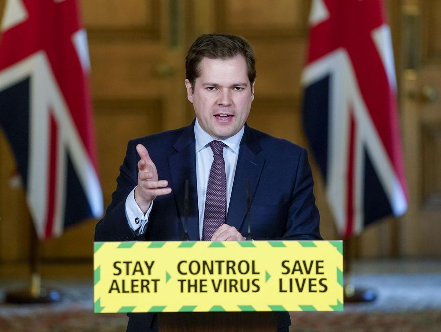 In this photo issued by 10 Downing Street, Britain&#x27;s Housing, Communities and Local Government Secretary Robert Jenrick speaks during a coronavirus media briefing in Downing Street, London, Wednesday, May 13, 2020. (Andrew Parsons/10 Downing Street via AP) ** FILE **