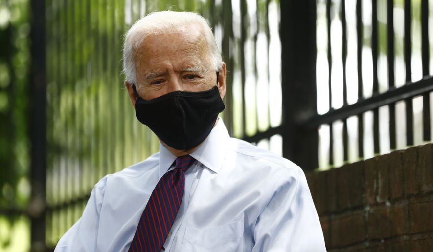 Democratic presidential candidate, former Vice President Joe Biden pales while speaking with families who have benefited from the Affordable Care Act, Thursday, June 25, 2020, in Lancaster, Pa. (AP Photo/Matt Slocum)