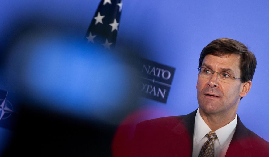 Defense Secretary Mark Esper, who has had his own public friction recently with the commander in chief, is trying to avoid getting pulled into a political battle with lawmakers who say President Trump is driving hirings, firings and promotions inside the Pentagon. (AP Photo/Virginia Mayo, Pool)