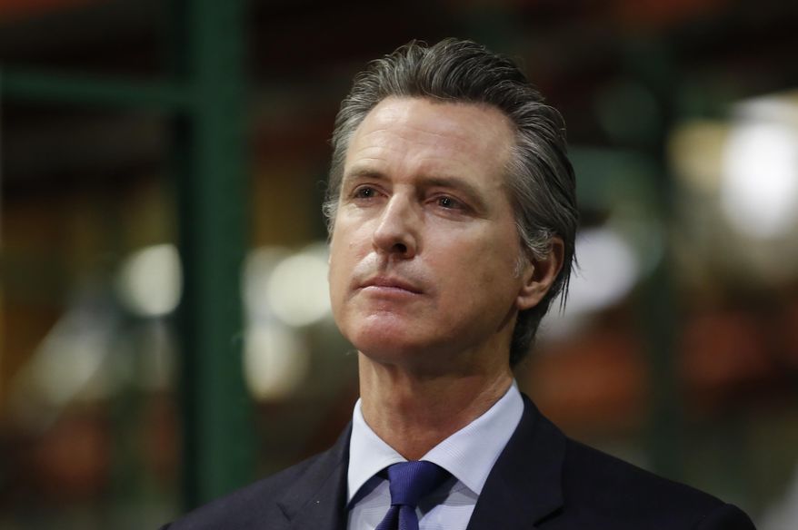 Gov. Gavin Newsom listens to a reporter's question as he gives an update on the state's response to the coronavirus pandemic, during a news conference in Rancho Cordova, Calif., Friday, June 26, 2020. Newsom said he wants Imperial County in Southern California to reimpose a stay-at-home order amid a surge in positive coronavirus tests. (AP Photo/Rich Pedroncelli, Pool)