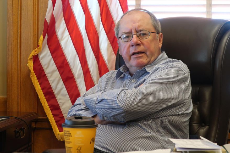 Kansas Senate Minority Leader Anthony Hensley, D-Topeka, answers questions during an Associated Press interview, Friday, June 26, 2020, in his Statehouse office in Topeka, Kan. Hensley suggests Republican legislative leaders are trying to score "gotcha points" by criticizing Democratic Gov. Laura Kelly's budget-balancing plans. (AP Photo/John Hanna)