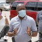 Houston Mayor Sylvester Turner speaks at a free COVID-19 testing provided by United Memorial Medical Center at the Mexican Consulate Sunday, June 28, 2020, in Houston. Confirmed cases of the coronavirus in Texas continue to surge. On Friday, Gov. Greg Abbott shut down bars again and scaled back restaurant dining as cases climbed to record levels after the state embarked on one of America's fastest reopenings. (AP Photo/David J. Phillip)