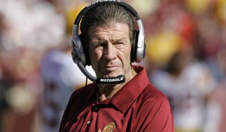 In this Sept. 23, 2007, file photo, Washington Redskins assistant head coach-offensive Joe Bugel looks on during an NFL football game in Landover, Md. Former Redskins assistant coach Bugel has died. He was 80. The team announced that Bugel died on Sunday, June 28, 2020. It did not disclose a cause of death. (AP Photo/Manuel Balce Ceneta, File)  **FILE**