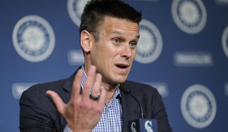 FILE - In this Jan. 23, 2020, file photo, Seattle Mariners general manager Jerry Dipoto speaks in Seattle. For a number of rebuilding teams, the 2020 baseball season was supposed to be another step in the progression of their top prospects eventually reaching the big leagues. By the time June rolled around, Dipoto expected former first-round pick Logan Gilbert to be pitching on the mound at T-Mobile Park. (AP Photo/Ted S. Warren, File)