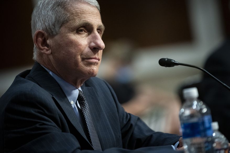 Director of the National Institute of Allergy and Infectious Diseases Dr. Anthony Fauci listens during a Senate Health, Education, Labor and Pensions Committee hearing on Capitol Hill in Washington, Tuesday, June 30, 2020. (Al Drago/Pool via AP)