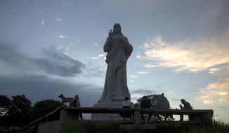 A Christ statue stands without tourists milling about, amid a lockdown affecting tourism to curb the spread of the COVID-19 pandemic in Havana, Cuba, Thursday, June 18, 2020. For state-run tourism, Cuba&#39;s success so far in controlling the coronavirus is becoming part of some companies&#39; marketing plans. (AP Photo/Ismael Francisco)