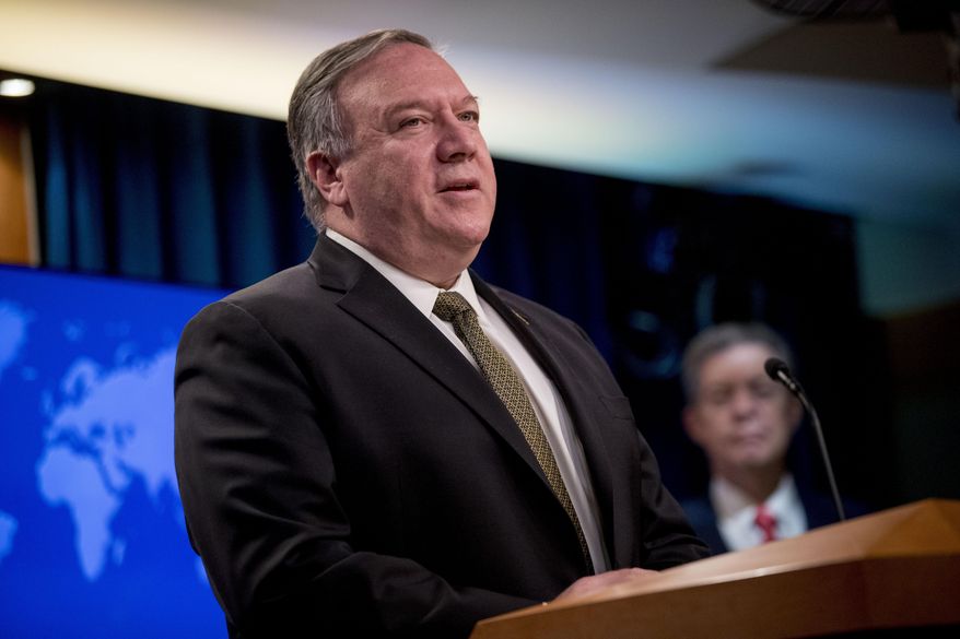 FILE - In this June 10, 2020, file photo, U.S. Secretary of State Mike Pompeo speaks during a news conference at the State Department in Washington. From Tokyo to Brussels, political leaders have swiftly decried Beijing's move to impose a tough national security law on Hong Kong that cracks down on subversive activity and protest in the semi-autonomous territory. But the rhetoric from democratic nations has more bark than bite. (AP Photo/Andrew Harnik, Pool, File)
