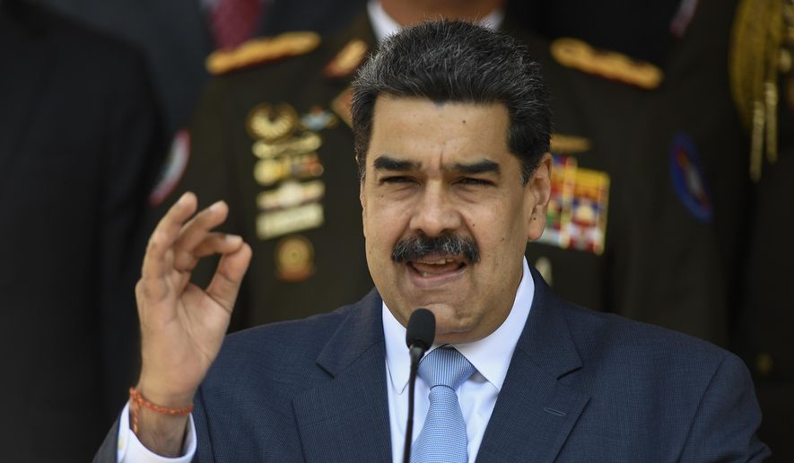 In this March 12, 2020, file photo, Venezuelan President Nicolas Maduro speaks during a press conference at the Miraflores Presidential Palace in Caracas, Venezuela. (AP Photo/Matias Delacroix, File)