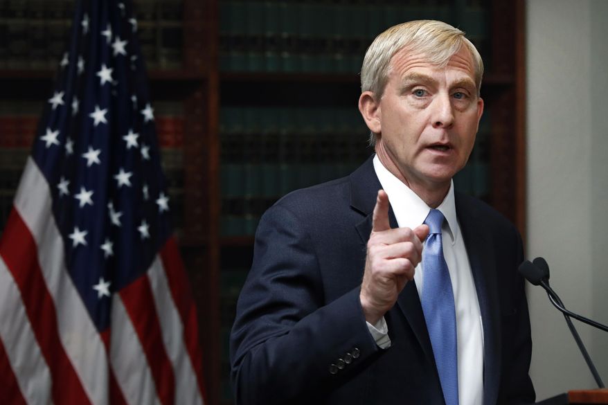 FILE - In this Tuesday, July 16, 2019, file photo, Richard Donoghue, U.S. Attorney for the Eastern District of New York, speaks during a news conference in his office, in the Brooklyn borough of New York. Donoghue, the U.S. attorney for the Eastern District of New York, told his staff Thursday, July 2, 2020, that he is leaving his post for a job at the U.S. Justice Department in Washington, and will become the top deputy to Deputy Attorney General Jeffrey A. Rosen. (AP Photo/Richard Drew, File)