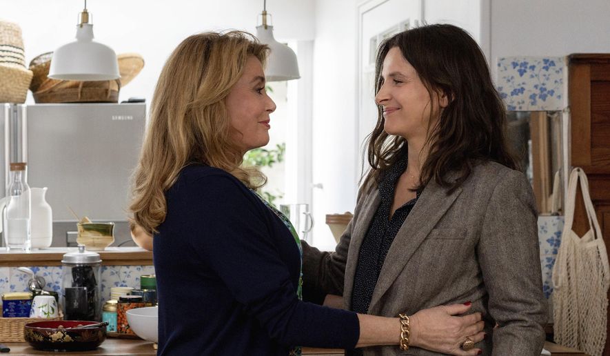 This image released by IFC Films shows Catherine Deneuve, left, and Juliette Binoche in a scene from &amp;quot;The Truth.&amp;quot; (IFC Films via AP)