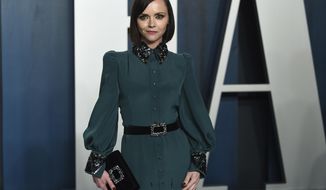 FILE - In this Feb. 9, 2020 file photo, Christina Ricci arrives at the Vanity Fair Oscar Party in Beverly Hills, Calif. The actress has filed for divorce from her husband of nearly seven years. Ricci filed documents in Los Angeles County Superior Court on Thursday to dissolve her marriage with James Heerdegen. (Photo by Evan Agostini/Invision/AP, File)