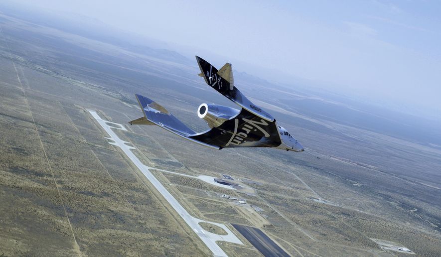 This photo provided by Virgin Galactic shows SpaceShipTwo Unity on it&#x27;s second successful glide flight over Spaceport America in New Mexico on Thursday, June 25, 2020. Virgin Galactic is celebrating the second successful glide flight of its spaceship over Spaceport America in southern New Mexico. (Virgin Galactic via AP)