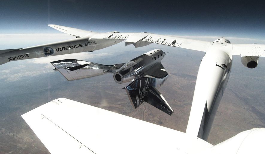 This photo provided by Virgin Galactic shows SpaceShipTwo Unity being released from the carrier mothership, VMS Eve for second successful glide flight in New Mexico on Thursday, June 25, 2020. Virgin Galactic is celebrating the second successful glide flight of its spaceship over Spaceport America in southern New Mexico. (Virgin Galactic via AP)