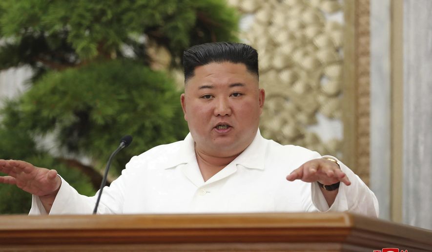 In this photo provided by the North Korean government, North Korean leader Kim Jong Un attends a politburo meeting of the Central Committee of the Workers' Party of Korea in Pyongyang, North Korea Thursday, June 2, 2020. Independent journalists were not given access to cover the event depicted in this image distributed by the North Korean government. The content of this image is as provided and cannot be independently verified. Korean language watermark on image as provided by source reads: "KCNA" which is the abbreviation for Korean Central News Agency. (Korean Central News Agency/Korea News Service via AP)