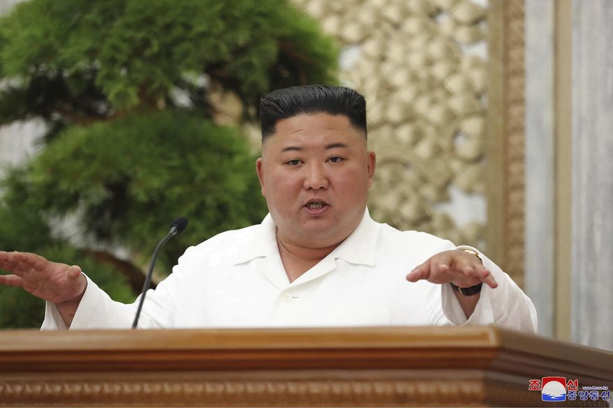 In this photo provided by the North Korean government, North Korean leader Kim Jong Un attends a politburo meeting of the Central Committee of the Workers' Party of Korea in Pyongyang, North Korea Thursday, June 2, 2020. Independent journalists were not given access to cover the event depicted in this image distributed by the North Korean government. The content of this image is as provided and cannot be independently verified. Korean language watermark on image as provided by source reads: "KCNA" which is the abbreviation for Korean Central News Agency. (Korean Central News Agency/Korea News Service via AP)
