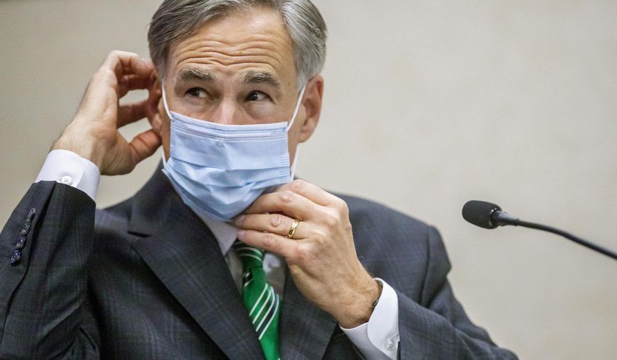 FILE - In this June 16, 2020, file photo, Texas Gov. Greg Abbott adjusts his mask after speaking in Austin, Texas.  Abbott on Thursday, July 2, ordered that face coverings must be worn in public across most of the state, a dramatic ramp up of the Republican&#39;s efforts to control spiking numbers of confirmed coronavirus cases and hospitalizations. (Ricardo B. Brazziell/Austin American-Statesman via AP, File)
