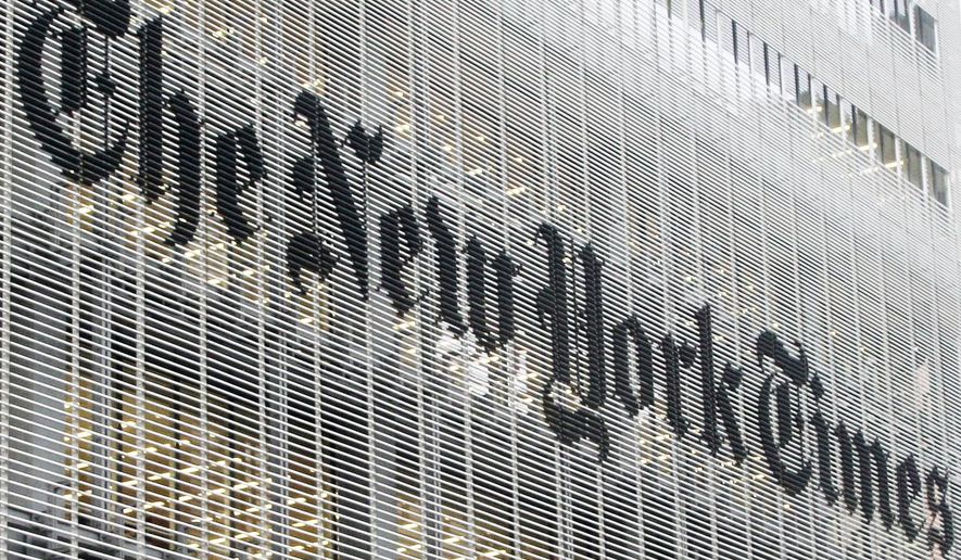 This Wednesday, Oct. 10, 2012, file photo shows The New York Times logo on the company&#39;s building in New York. (AP Photo/Richard Drew) ** FILE **
