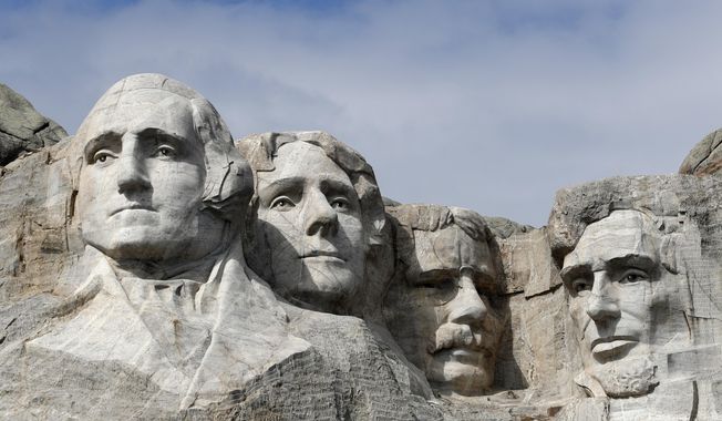 FILE - This March 22, 2019, file photo shows Mount Rushmore in Keystone, S.D.  President Donald Trump will begin his Independence Day weekend on Friday with a patriotic display of fireworks at Mount Rushmore National Memorial before a crowd of thousands. (AP Photo/David Zalubowski, File)